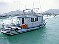 B�ten vi hyrde f�r en fisketur utanf�r Pattong Beach 2003
